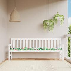 White garden bench with multicolor bird and leaf polyester cushion on a sunny balcony.