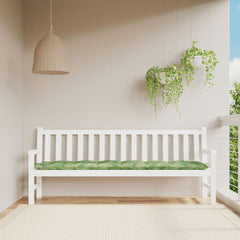 Green leaf-pattern polyester bench cushion on white garden bench.