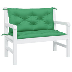 Two green Oxford fabric bench cushions with ties, sized 39.4x19.7x2.8 inches, for garden seating.