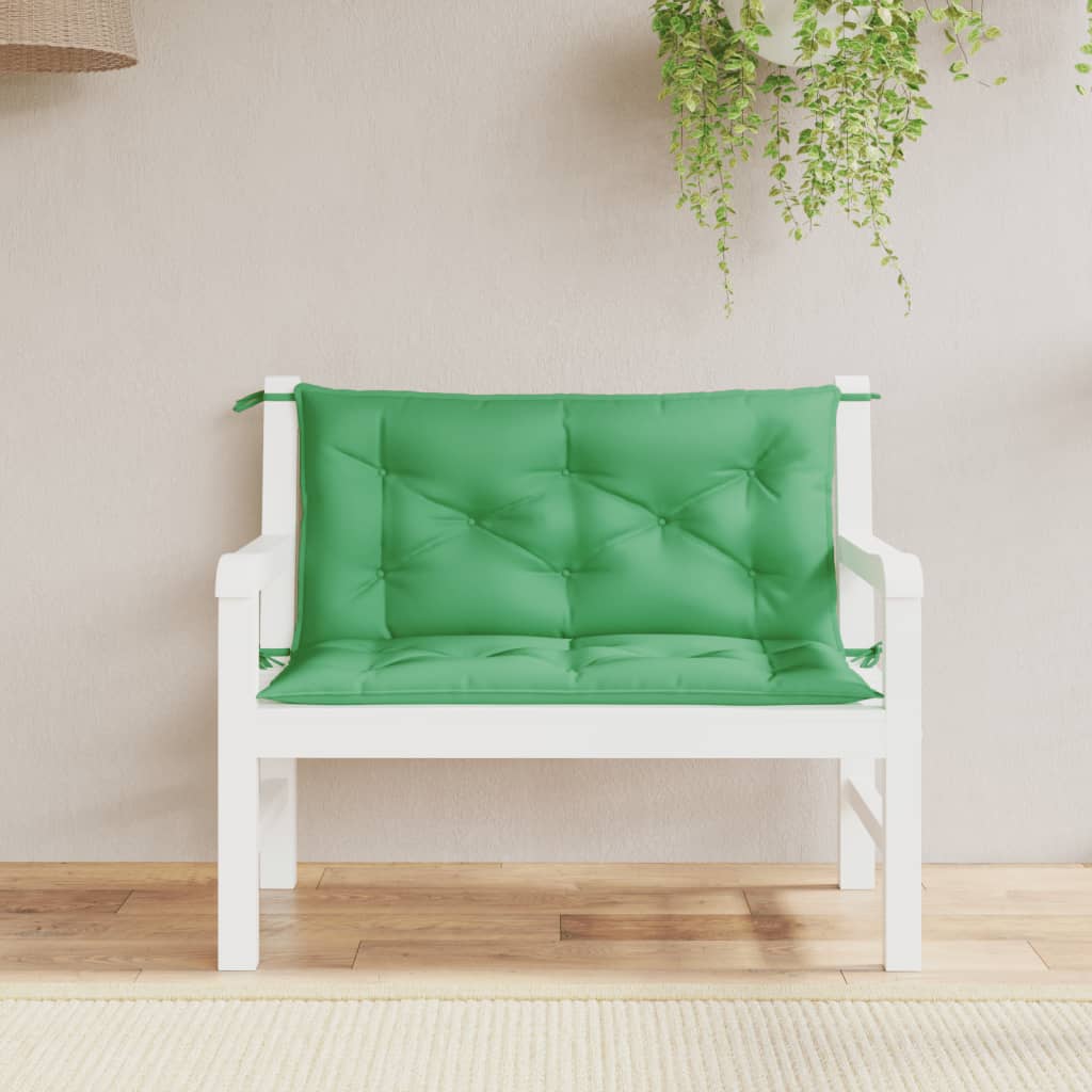 Two green Oxford fabric bench cushions with ties, sized 39.4x19.7x2.8 inches, for garden seating.