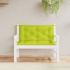 A pair of bright green Oxford fabric cushions for a white wooden garden bench, with ties and tufted padding.