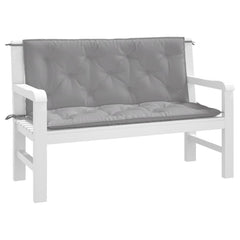 Two gray Oxford fabric bench cushions, 47x20 inches, for garden benches.