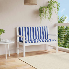 Two blue and white striped garden bench cushions on a white bench.