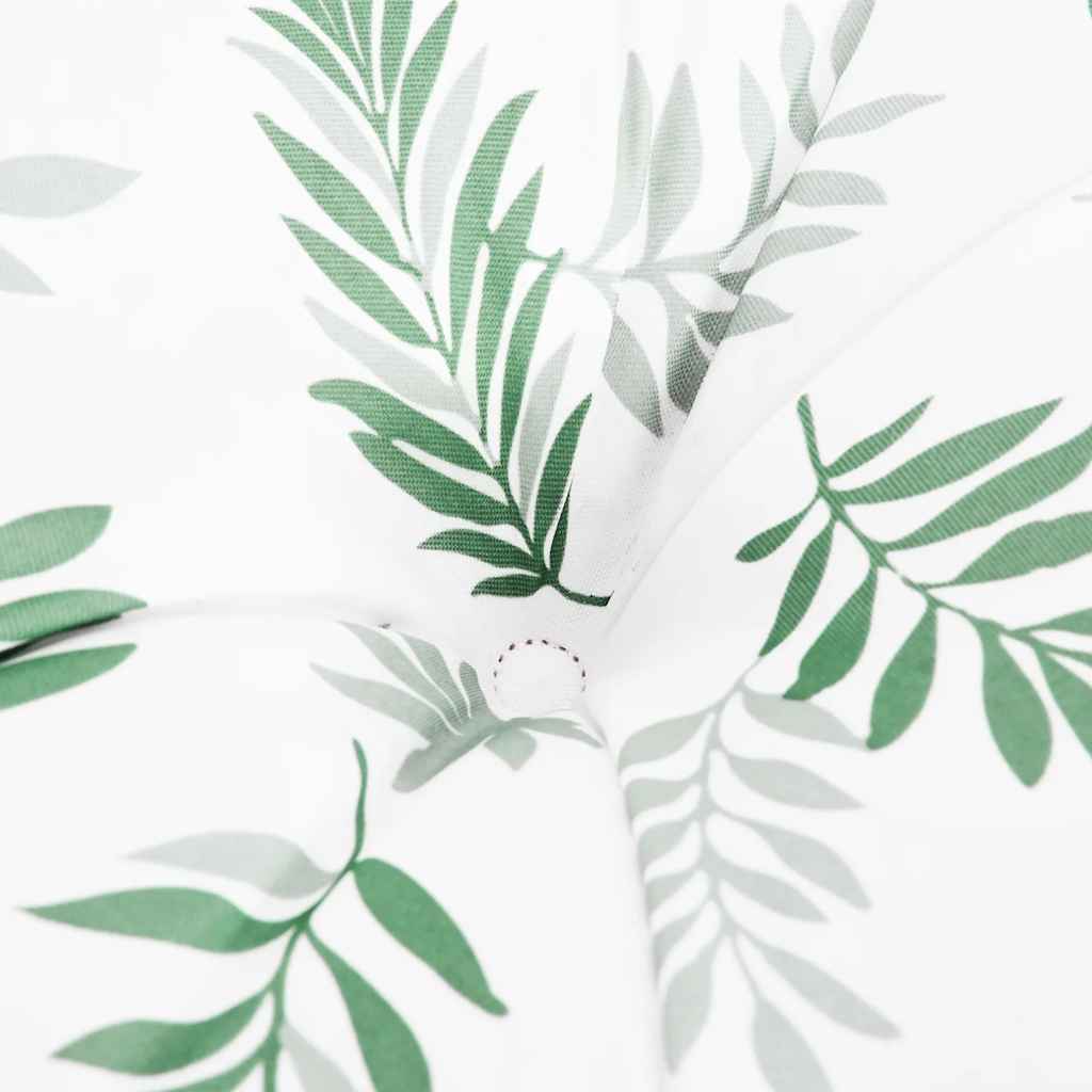 Cushions with a vibrant leaf pattern for garden benches, made from durable, water-repellent fabric.