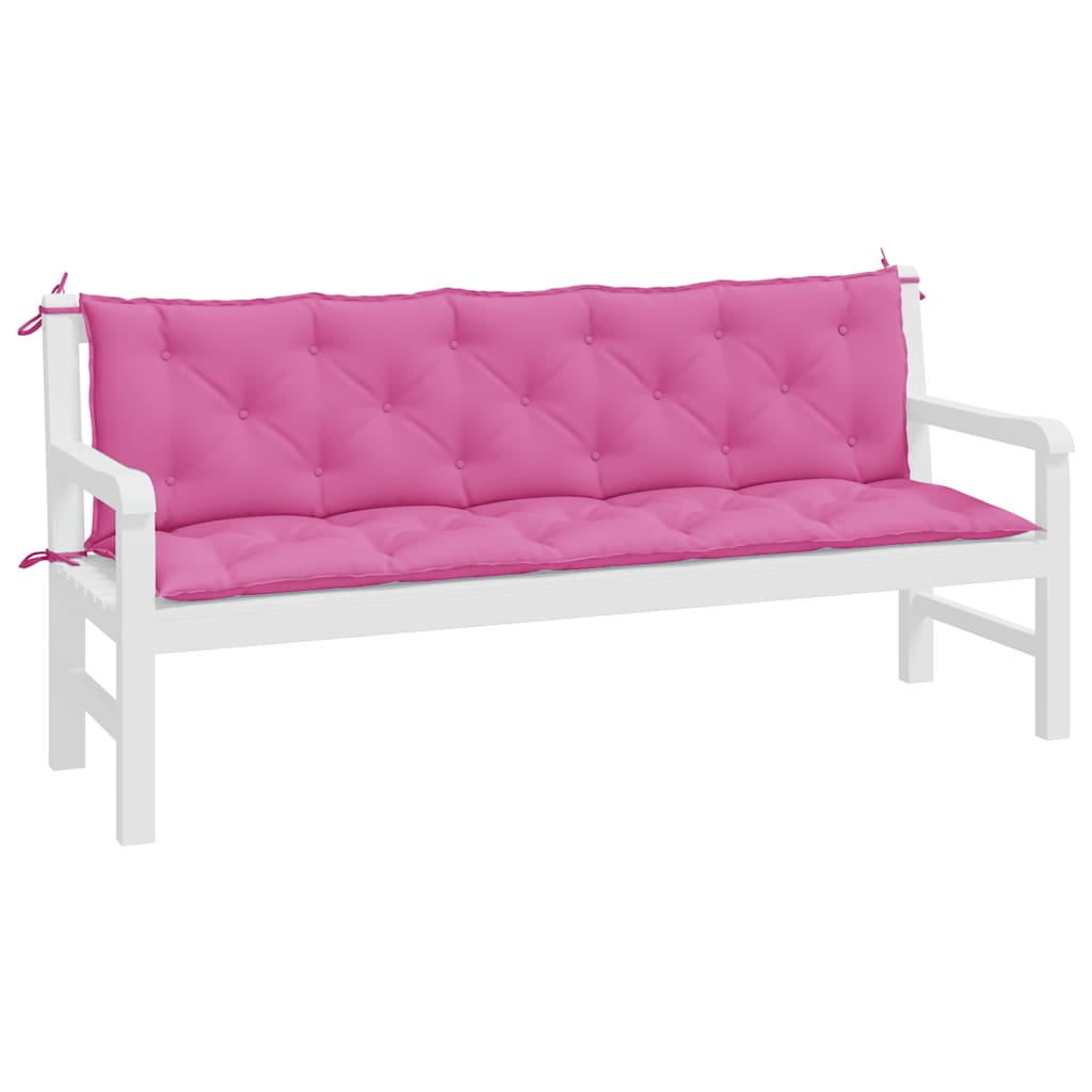 Two pink Oxford fabric cushions with tufted design and ties for a garden bench.