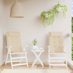 Two beige Oxford fabric highback chair cushions with ties, shown on patio chairs.