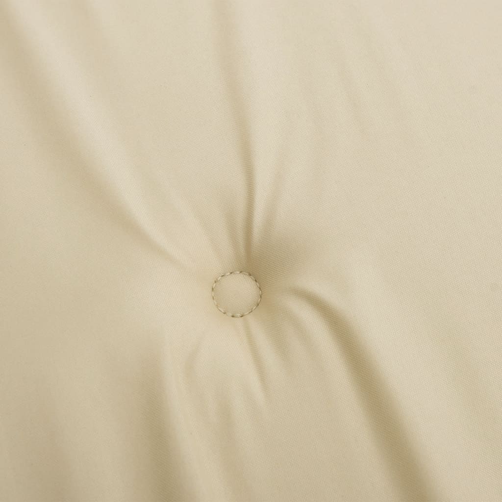 Close-up of beige Oxford fabric on a highback chair cushion with tufted button detail.