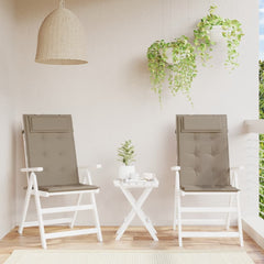 Two taupe Oxford fabric highback chair cushions on white patio chairs with a small table.