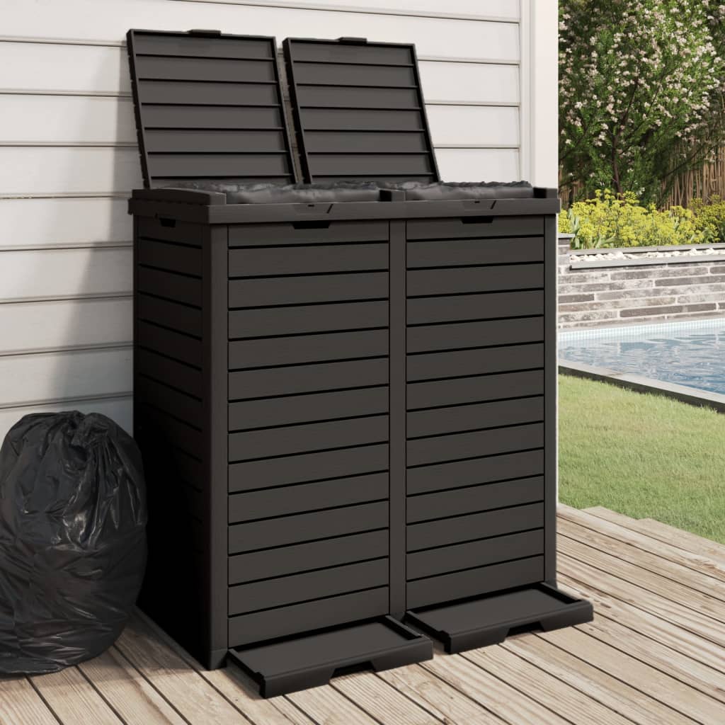 Black polypropylene outdoor garbage bin with double lids and wood texture finish.