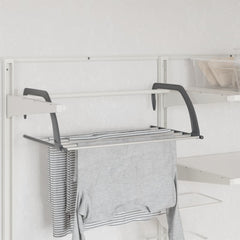 Two silver aluminum drying racks with foldable arms hanging on a wall rack.
