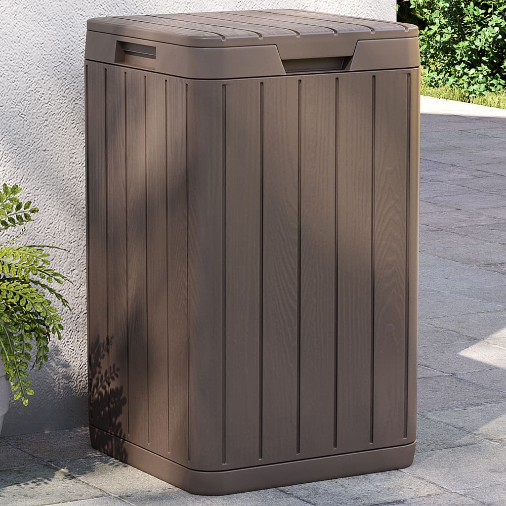 Brown Bostome 21.1-gallon outdoor garbage bin with wood-like slatted design on patio.