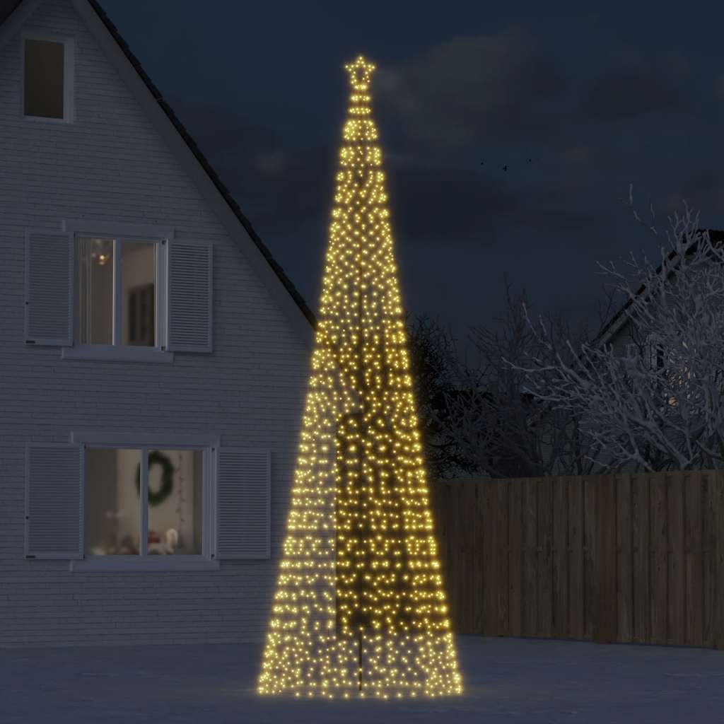 Bostome LED Christmas tree with 1554 warm white lights and sturdy metal stand for outdoor use.
