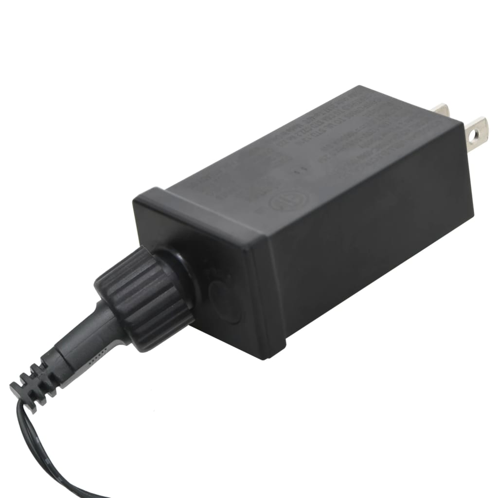 Black rectangular power adapter with plug and cord for LED Christmas tree.