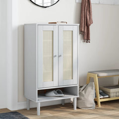 White shoe cabinet with rattan-look doors, solid pine wood, and open bottom shelf.