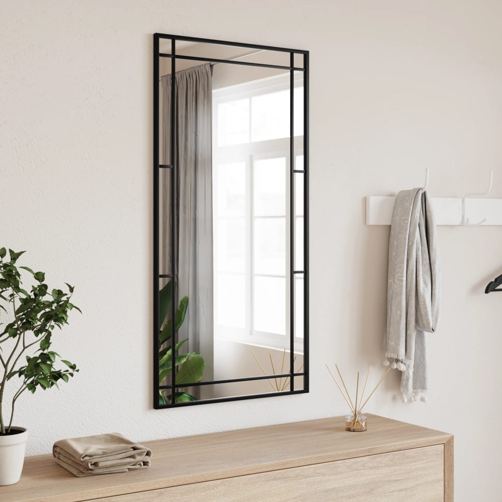 Black rectangular wall mirror with iron frame, 19.7x39.4 inches, mounted vertically.
