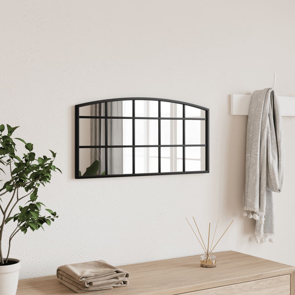 Black arched iron wall mirror, 23.6x11.8 inches, mounted on a light wall.