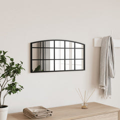 Black arched iron wall mirror, 23.6x11.8 inches, mounted on a light wall.