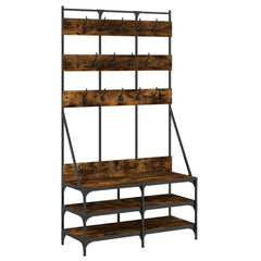 Tall smoked oak clothes rack with hooks, bench, and multi-tier shoe shelves on black metal frame.