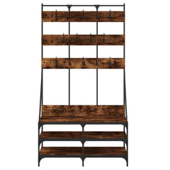 Smoked oak clothes rack with hooks, shelves, and shoe storage on metal frame.