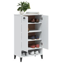 White engineered wood shoe cabinet with doors open, storing multiple shoe pairs on shelves.
