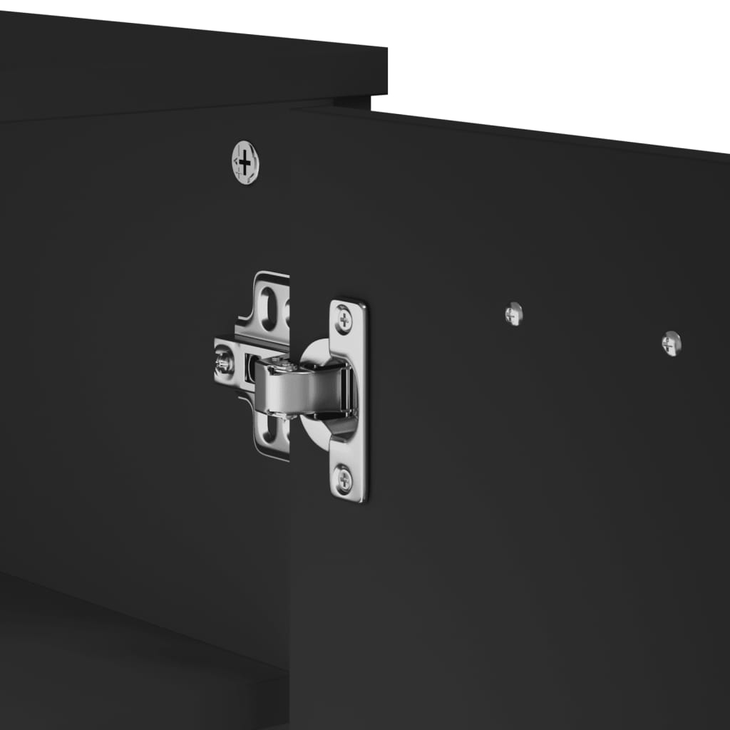 Black engineered wood shoe cabinet with two doors and metal hinges for storing shoes.
