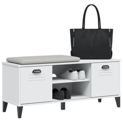 White Viken shoe bench with gray cushioned seat, two louvered doors, open shoe compartments, and a black handbag on top.