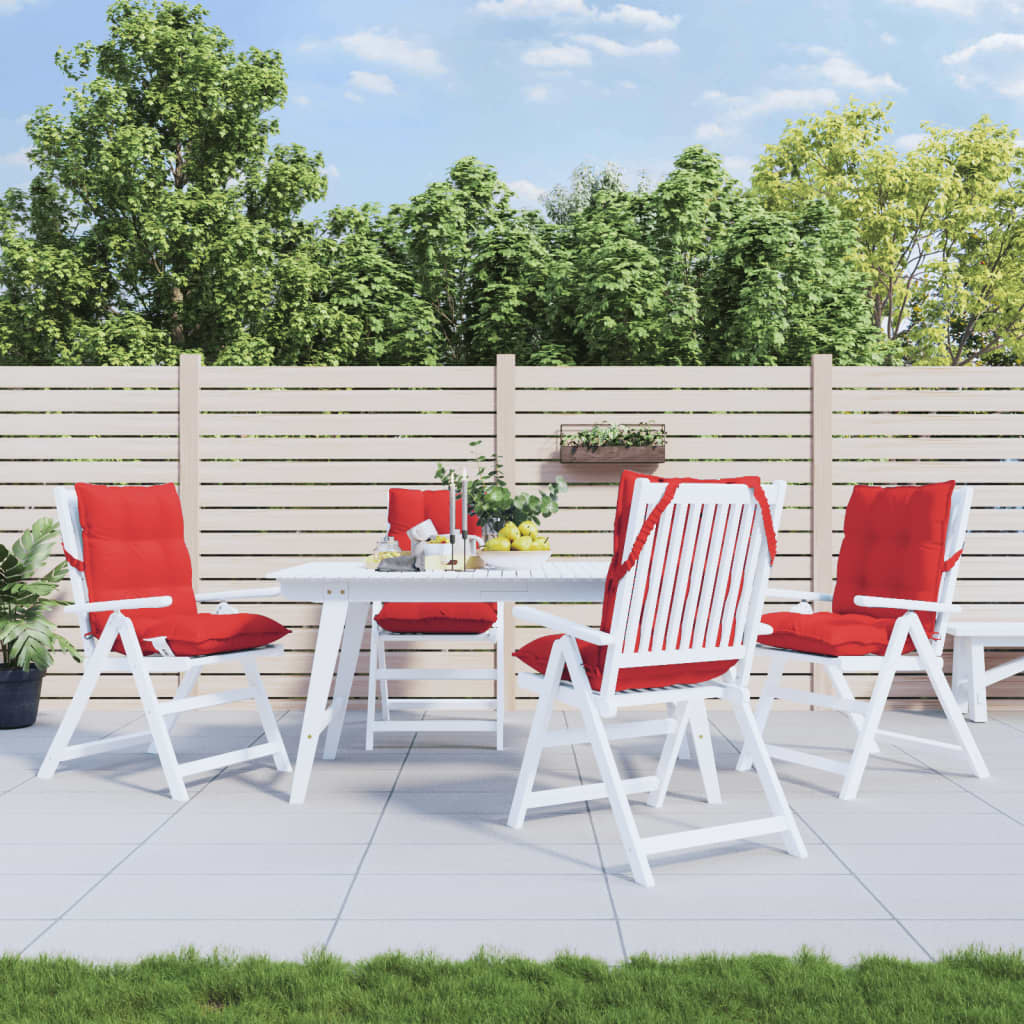 Four red Oxford fabric cushions on white lowback patio chairs around a table.