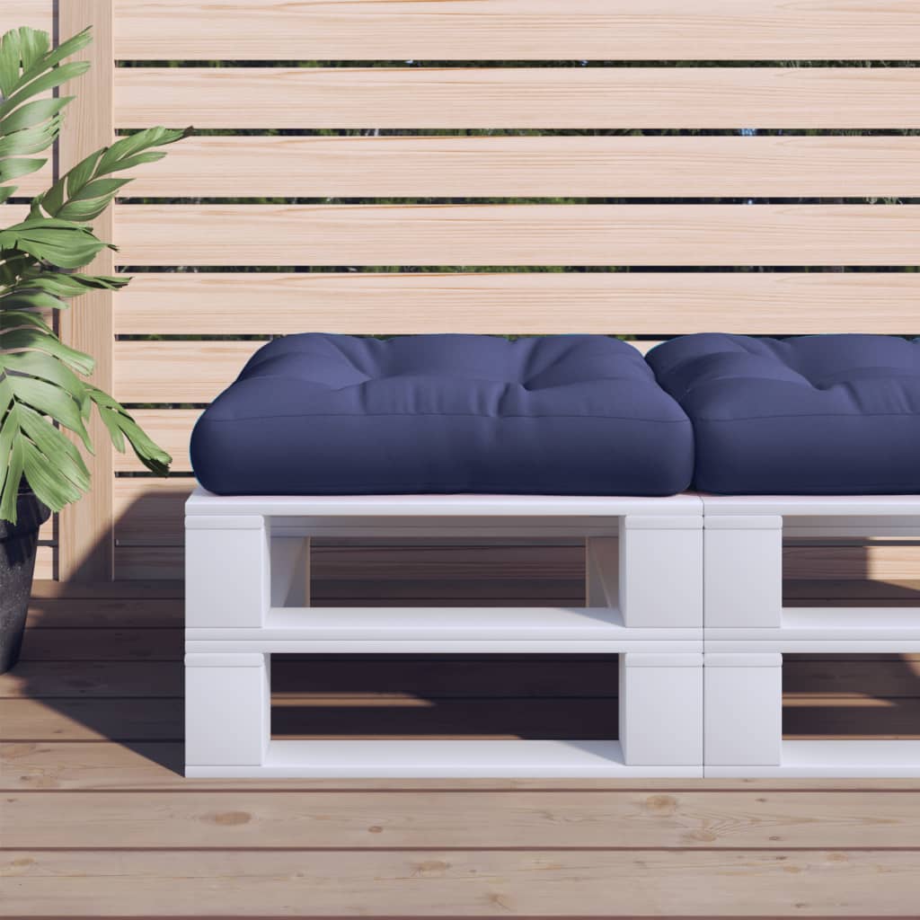 Navy blue polyester pallet cushion, 19.7x19.7x4.7 inches, on white pallet with plants.