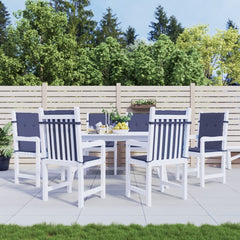 Six navy blue polyester cushions on white lowback chairs around an outdoor table.