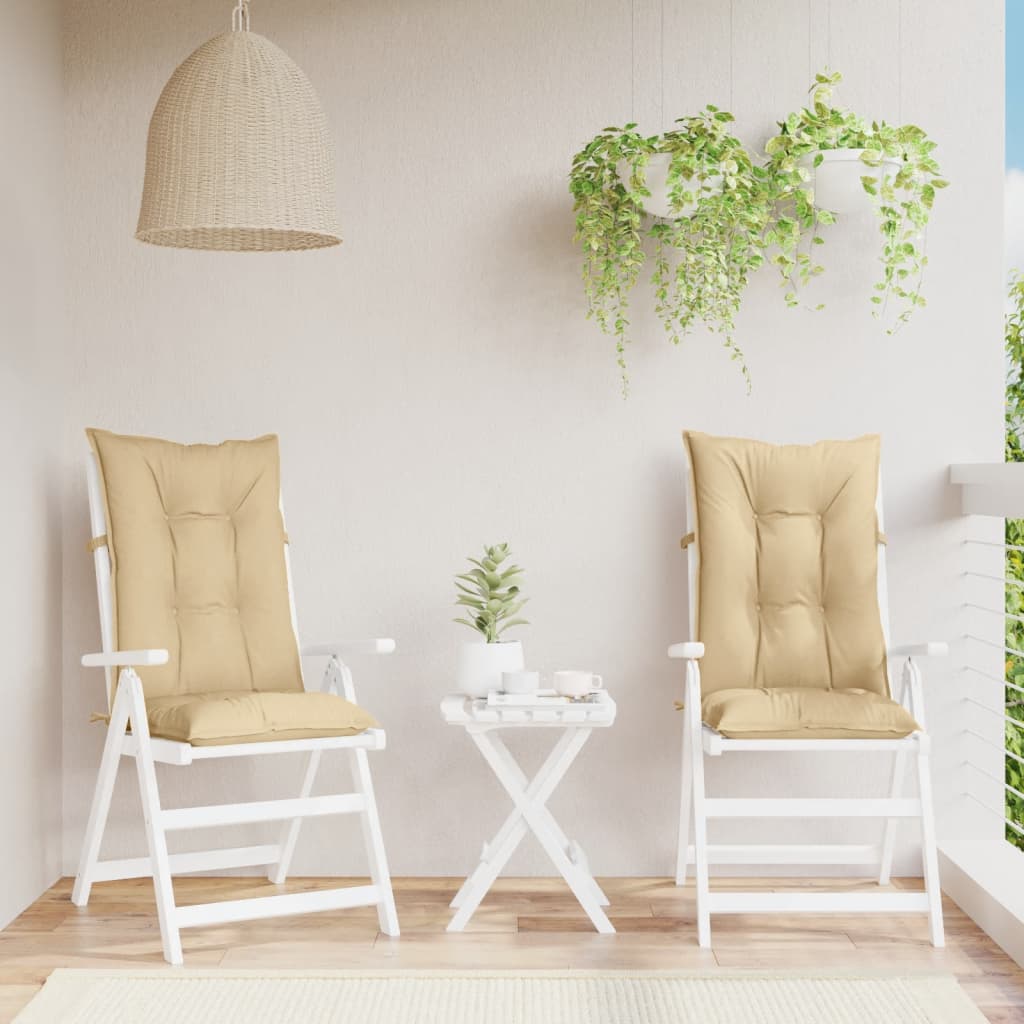 Two beige melange highback chair cushions on white folding chairs with a small table.