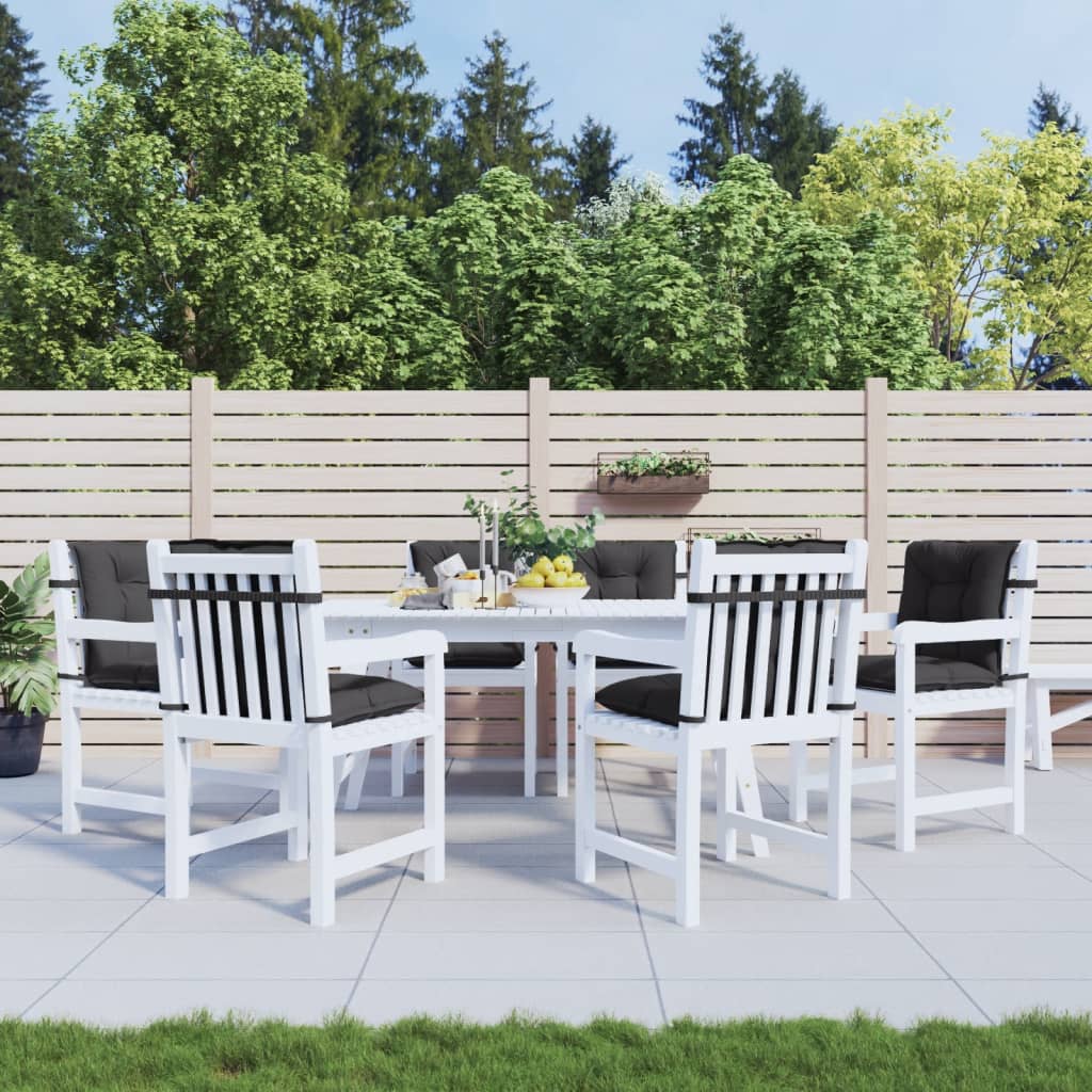 Six anthracite low-back chair cushions are shown on white patio chairs around a table.