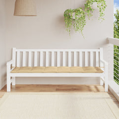 Beige melange fabric bench cushion with tufted top and corner ties on a white garden bench.