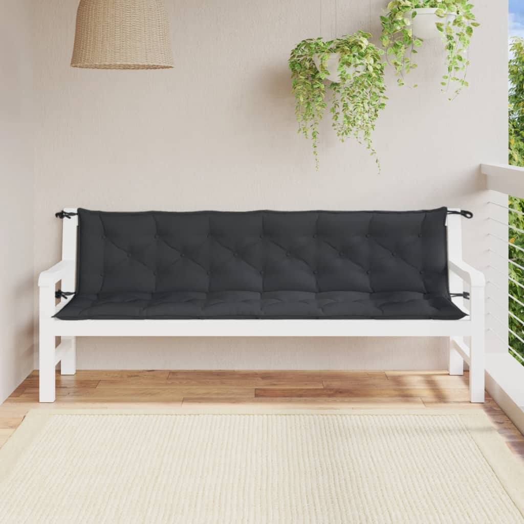 Two anthracite melange garden bench cushions on a white outdoor bench.