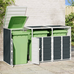 Anthracite steel wheelie bin storage unit holding three open green bins against a brick wall.