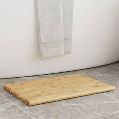 Two bamboo bath mats, each 19.7x13.8 inches with slatted design, placed near a white bathtub with a gray towel hanging nearby.