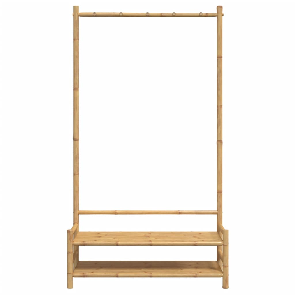 Bamboo clothes rack with upper hanging rail and lower shelves, 40.6x15.7x72 inches.
