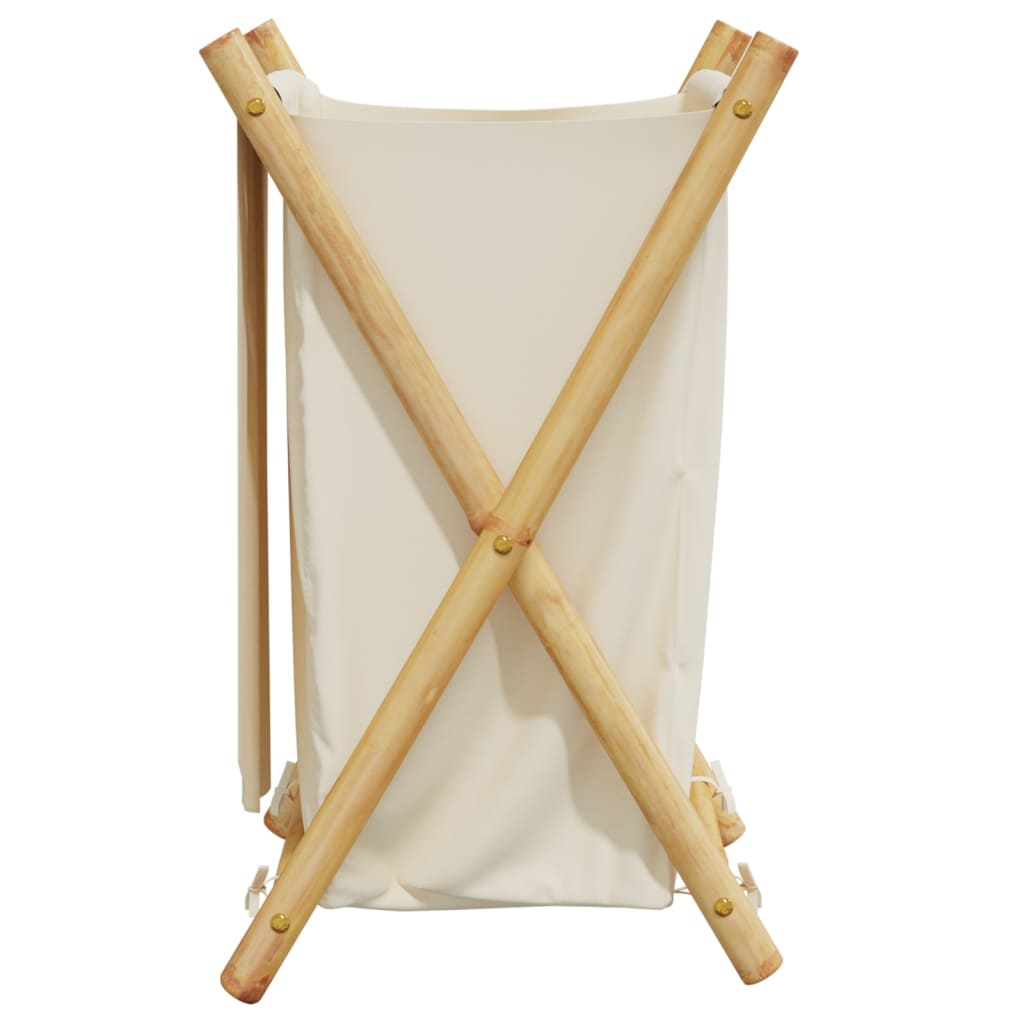 Foldable bamboo laundry basket with cream white fabric and wooden frame.