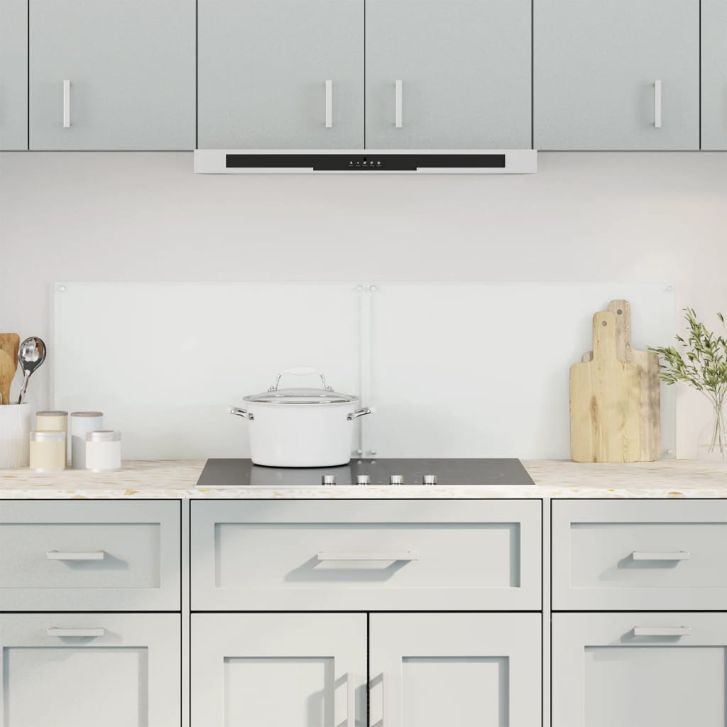 Two transparent tempered glass backsplash panels, 27.6x15.7 inches each, installed on a white kitchen wall above a stove.