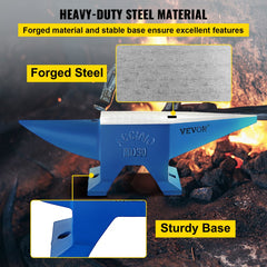 Blue 66 lb forged steel horn anvil with sturdy base on workshop floor.