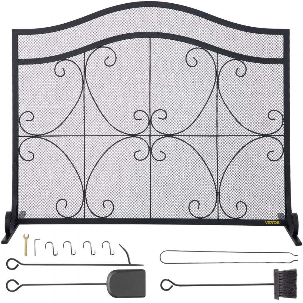 Black iron fireplace screen with a double-door design and geometric patterns for spark protection.