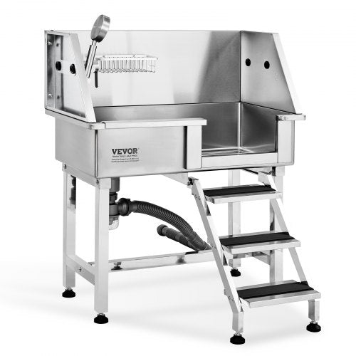 Stainless steel dog grooming tub with ramp, faucet, and anti-slip surfaces for safety.