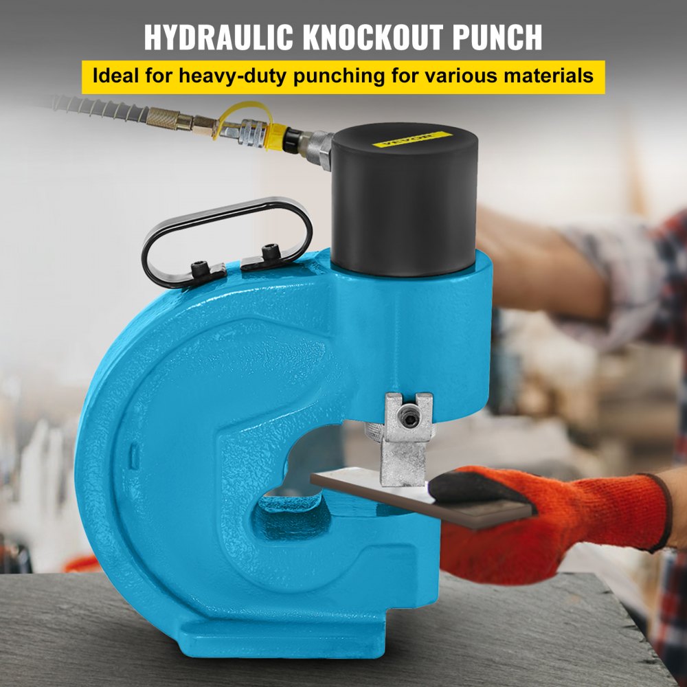 Blue Bostome CH-70 35T hydraulic hole puncher with 1/2-inch capacity and 4.3-inch throat, connected to a pump and held by gloved hands.