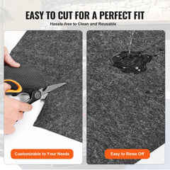 Gray-black TPE garage floor mat roll, 8'10"x22', shown being cut with scissors and water rinsing off surface.