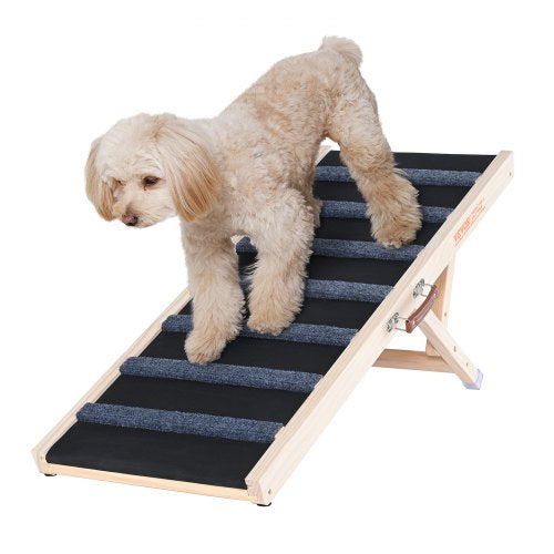 A beige poodle climbs a wooden adjustable dog ramp with black treads and folding legs.