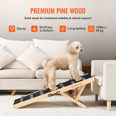 A beige poodle stands on a folding wooden dog ramp with black treads, set against a white couch.