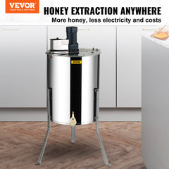 Stainless steel electric honey extractor with adjustable height and clear safety lid.