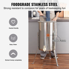 Electric honey extractor with 2/4 frame stainless steel drum on adjustable stand.