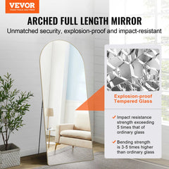 Black aluminum framed arched full length mirror measuring 71"x30" with clear reflections.