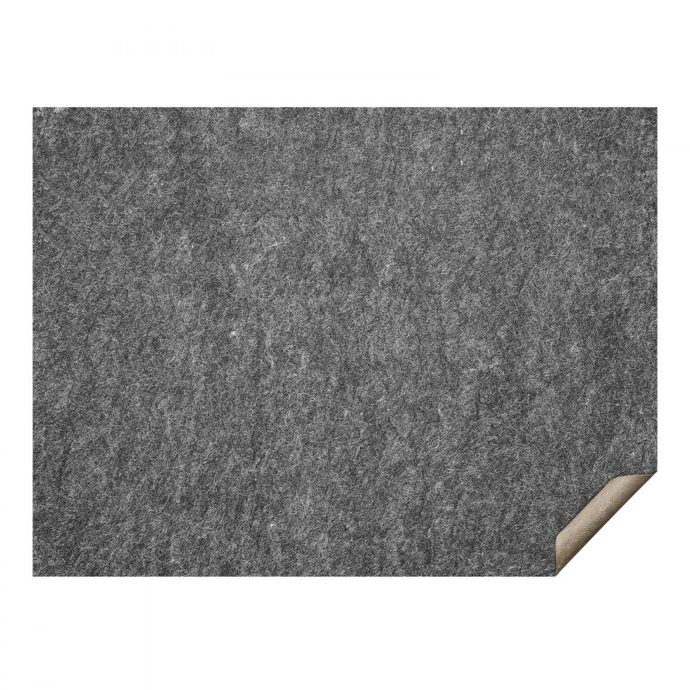 Gray felt rug pad with a curled corner revealing the tan underside.