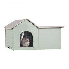Green heated cat house with waterproof cover, removable door, and thermal insulation pad.